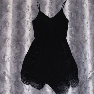 Black sheer romper with lace size M